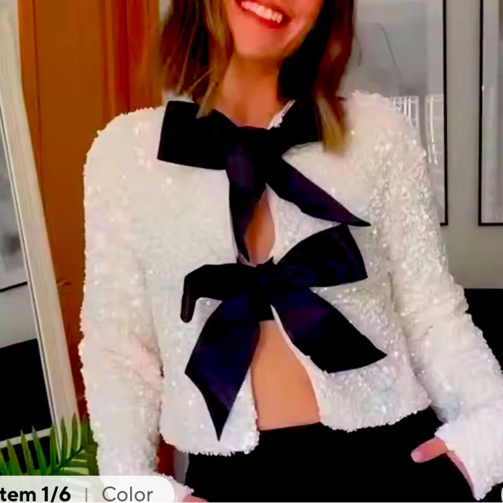 Elegant White Jacket with Black Bow Accents
